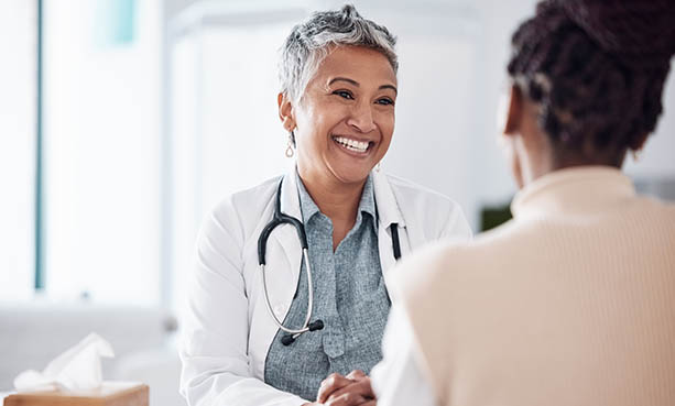 female doctor talking to patient